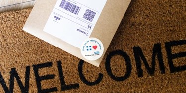 Royal Mail delivery of Pharmacy2U prescription on welcome mat