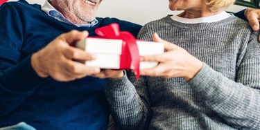 Woman giving partner a gift