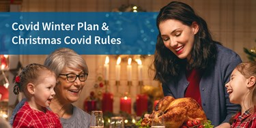 Family enjoying Christmas dinner (1)