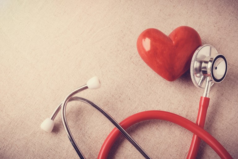 red heart with stethoscope, heart health, health insurance concept, world health day, doctor day, world hypertension day