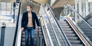 Travel Escalator Man
